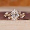Oval diamond engagement ring with oval cluster diamond ring.
