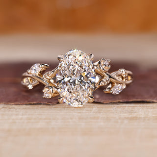 Oval diamond engagement ring with oval cluster diamond ring.
