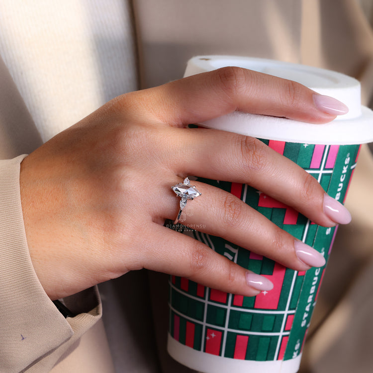 White gold diamond ring with marquise rose cut engagement ring.
