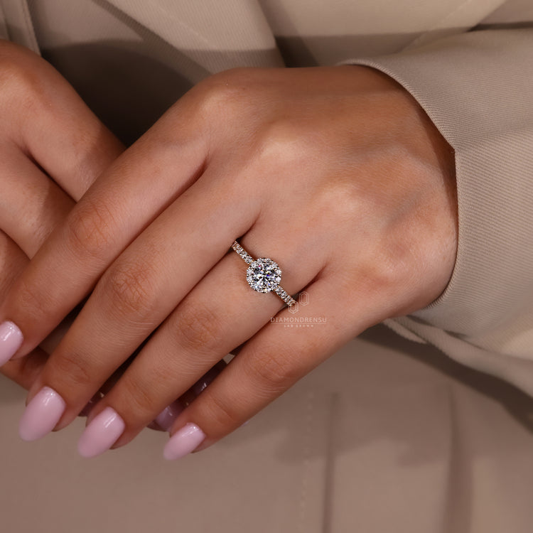 Halo diamond ring with round cut lab grown centre.
