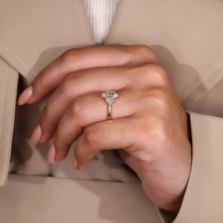 Lab grown marquise diamond ring in custom yellow gold setting.
