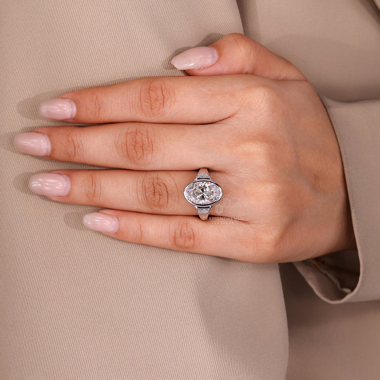Bezel set oval cut diamond ring Diamondrensu AU.
