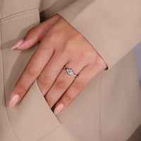Lab grown diamond set in three stone diamond engagement ring.
