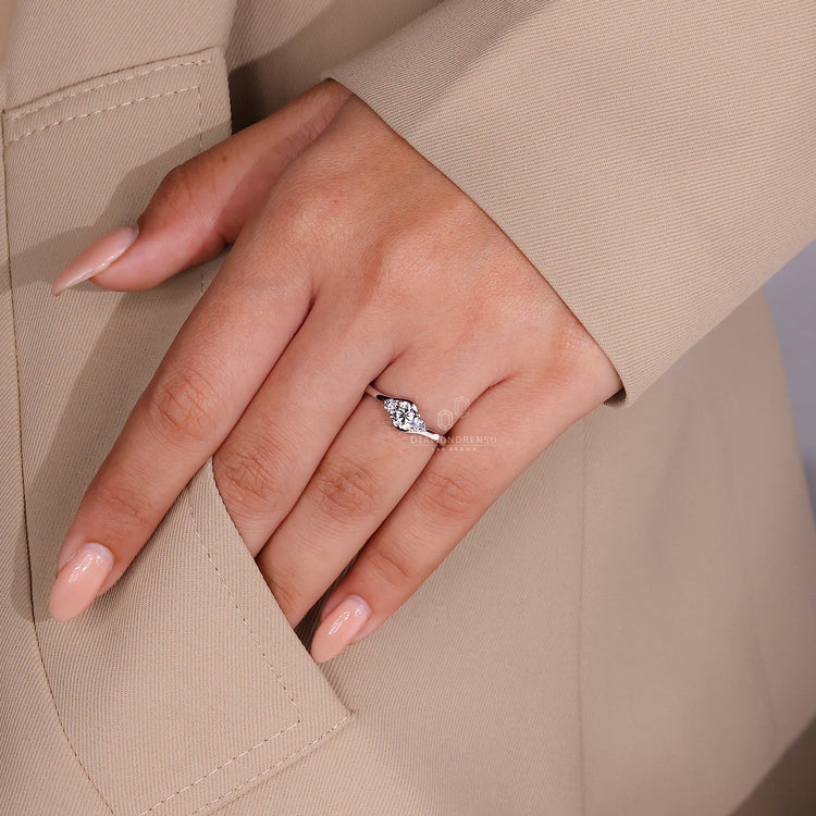 Lab grown diamond set in three stone diamond engagement ring.
