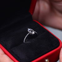 Round side diamond with pave setting ring.
