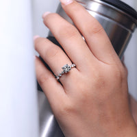 Shared prong setting in white gold engagement ring.
