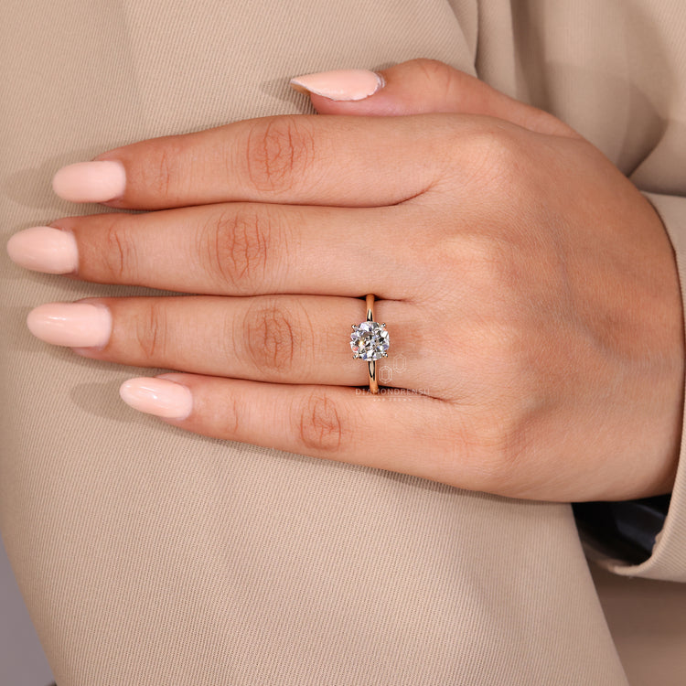 Handmade round old European cut ring solitaire style.