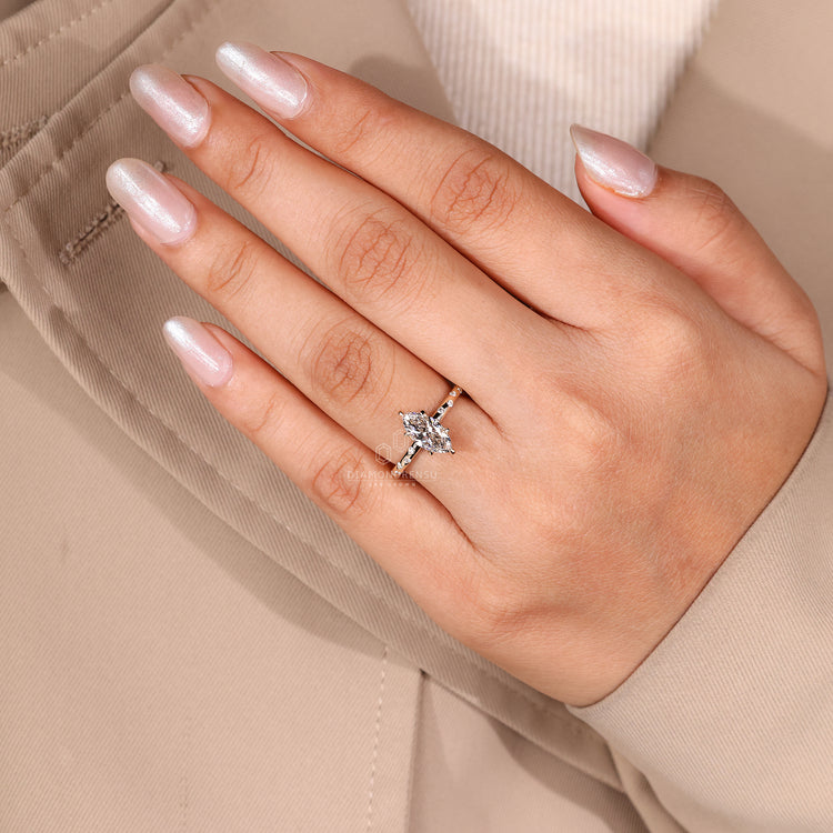 Custom Engagement Ring with marquise and round diamonds.
