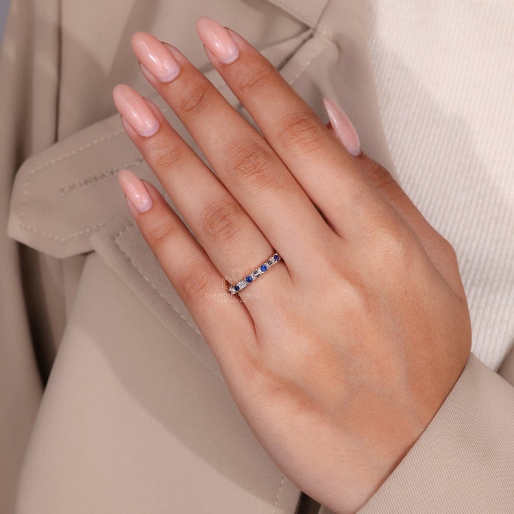 Full eternity diamond wedding band for her.