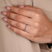 Bar setting band with lab grown diamonds.

