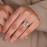 Bezel diamond ring with open gallery detail.
