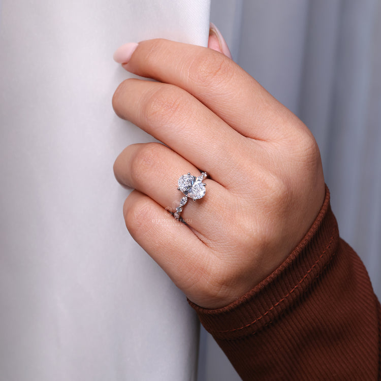 White gold diamond ring with oval diamond engagement ring.
