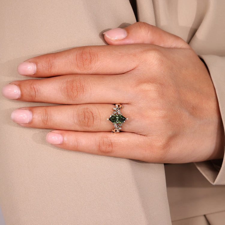 Dutch marquise ring green diamond leaf prong setting.