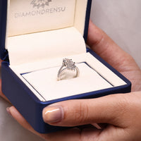 Hexagon step cut ring double curved band six claw.
