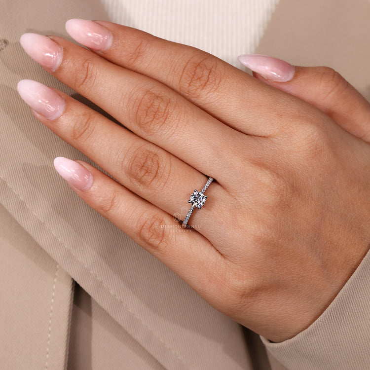 Handmade round cut diamond ring pave tapered shank.
