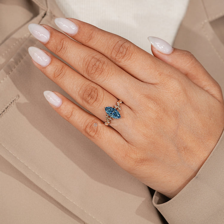 Handmade marquise diamond ring with tulip basket.