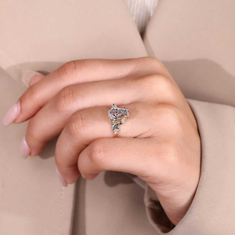 Lab grown coffin diamond ring five stone style.