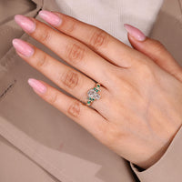 Coffin diamond ring green side stones style.