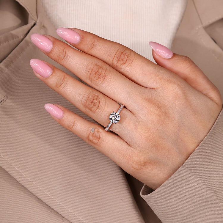 Round cut diamond ring with IGI certified diamond.
