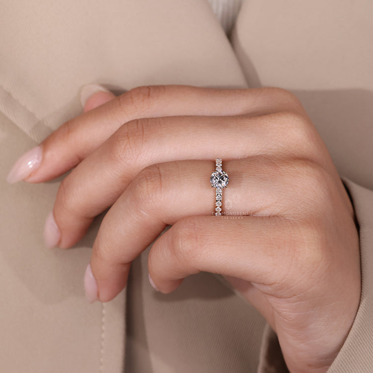 Handmade pave setting round diamond ring design.
