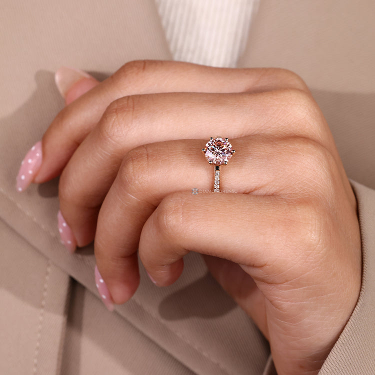 Lab grown round diamond ring with pink diamond.