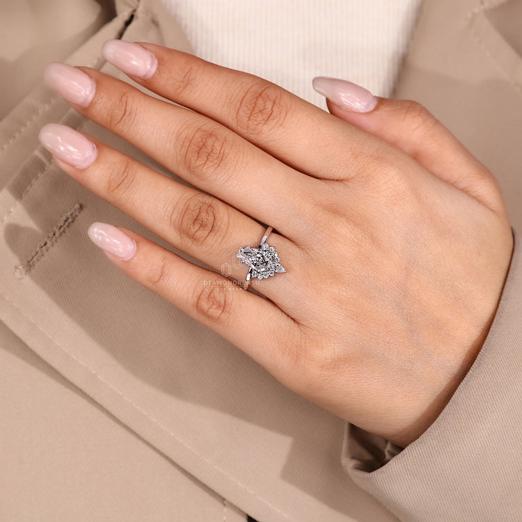 Coffin diamond ring elegant vintage halo style.