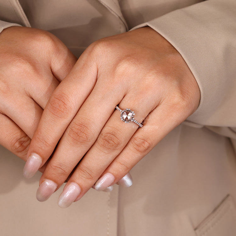 Halo and pave round rose cut diamond ring style.
