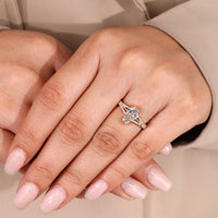 Coffin diamond ring round diamonds split shank.