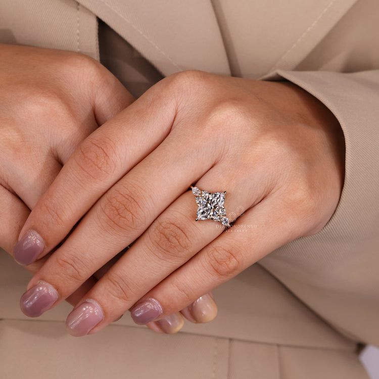 Marquise diamond ring with six claw prong setting.
