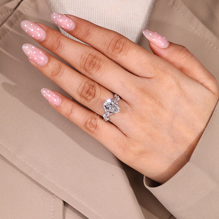 Coffin diamond ring cluster style prong setting.