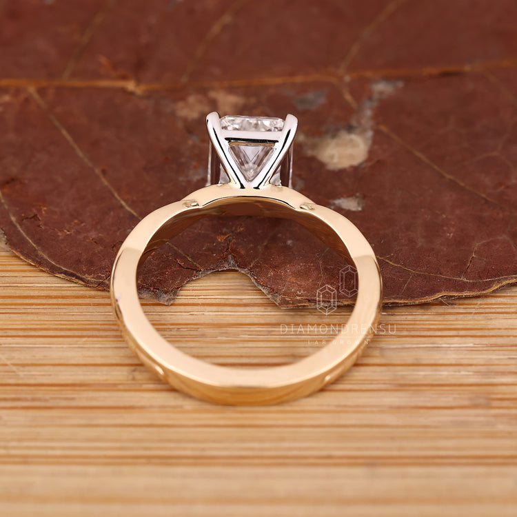Radiant cut diamond ring with secure claw prongs.

