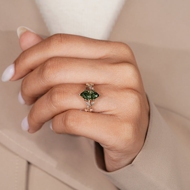 Dutch marquise ring with marquise diamond side stones.