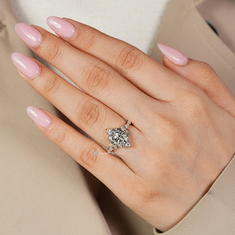Marquise diamond ring shared prong pave style