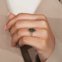 Marquise diamond ring with tulip basket setting.