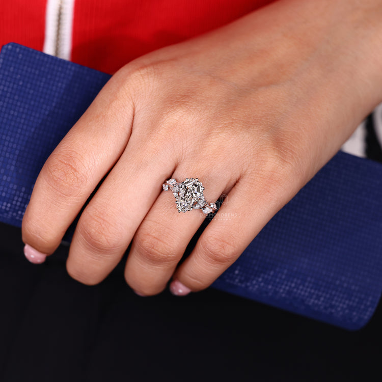 Coffin cut ring six prong cluster setting.