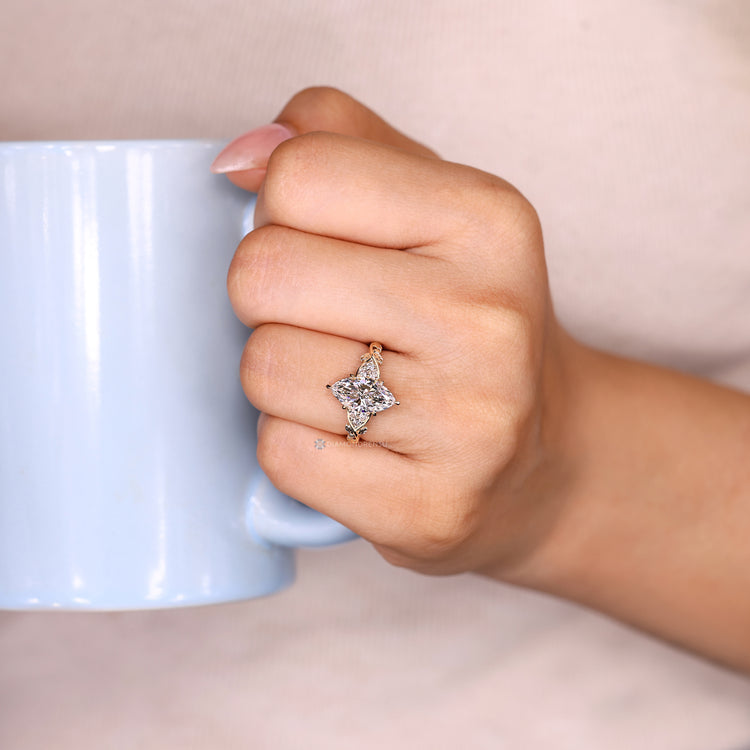 Marquise cut ring nature inspired leaf detailing.
