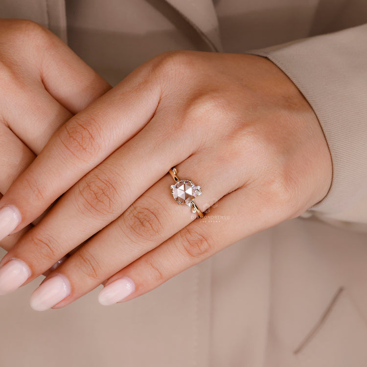 IGI certified ring with round side stone.
