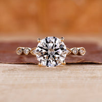 Round engagement ring with 4 prong setting.
