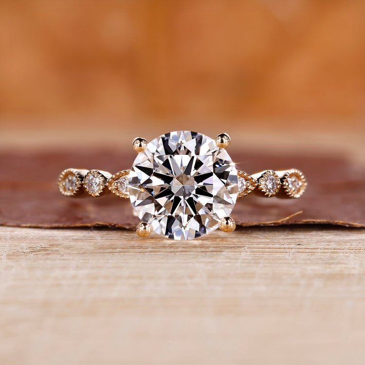 Round engagement ring with 4 prong setting.
