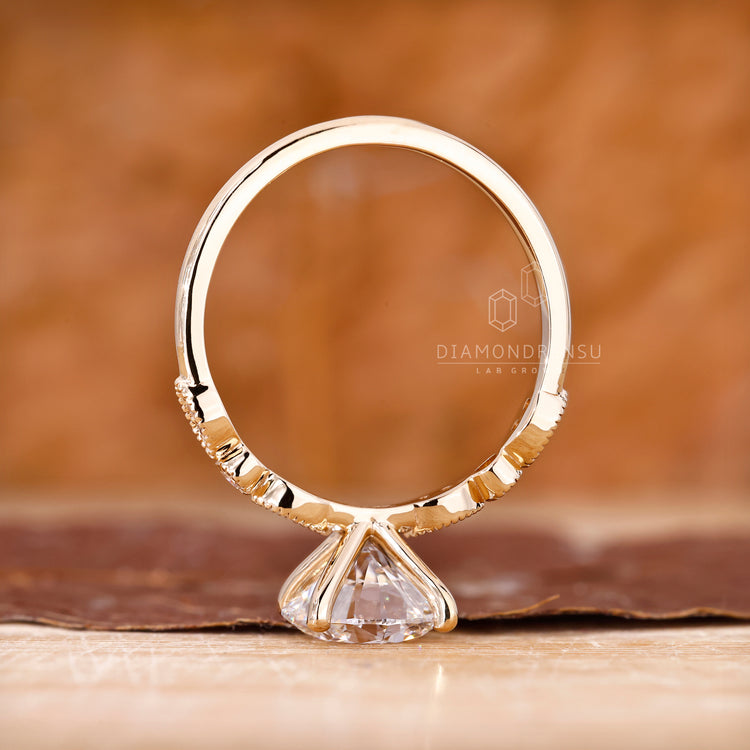 Yellow gold custom engagement ring design.
