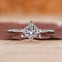 Princess cut engagement ring and solitaire engagement ring.
