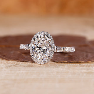 Oval shaped engagement ring with tapered baguette side stones.
