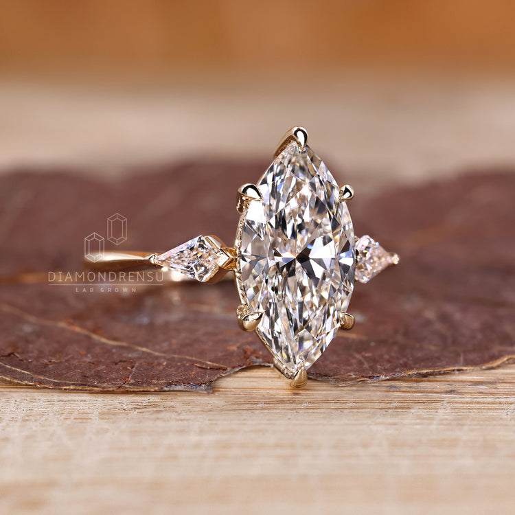 Hidden halo ring with marquise lab grown diamond.