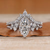 Marquise diamond bridal set with round side stones.