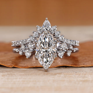 Marquise diamond bridal set with round side stones.