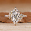 Marquise cut diamond ring shared prong pave style
