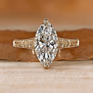 Marquise diamond ring with vintage solitaire design.