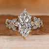 Marquise diamond ring with round and marquise side stones.