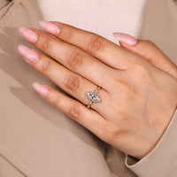 Marquise diamond ring four prong setting style.