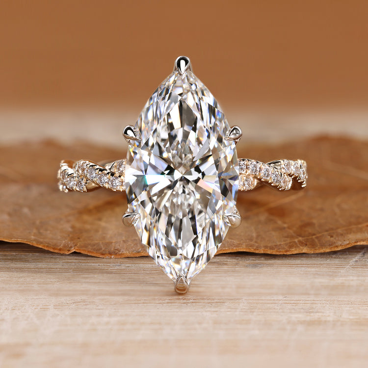 Marquise diamond ring with tulip basket setting.